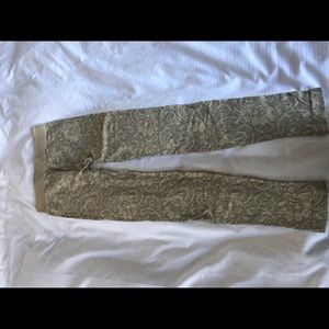 Cream and black leggings with floral designs O/S